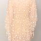 Custom couture beaded cape midi made to order featuring mother of pearl button details showing from the back